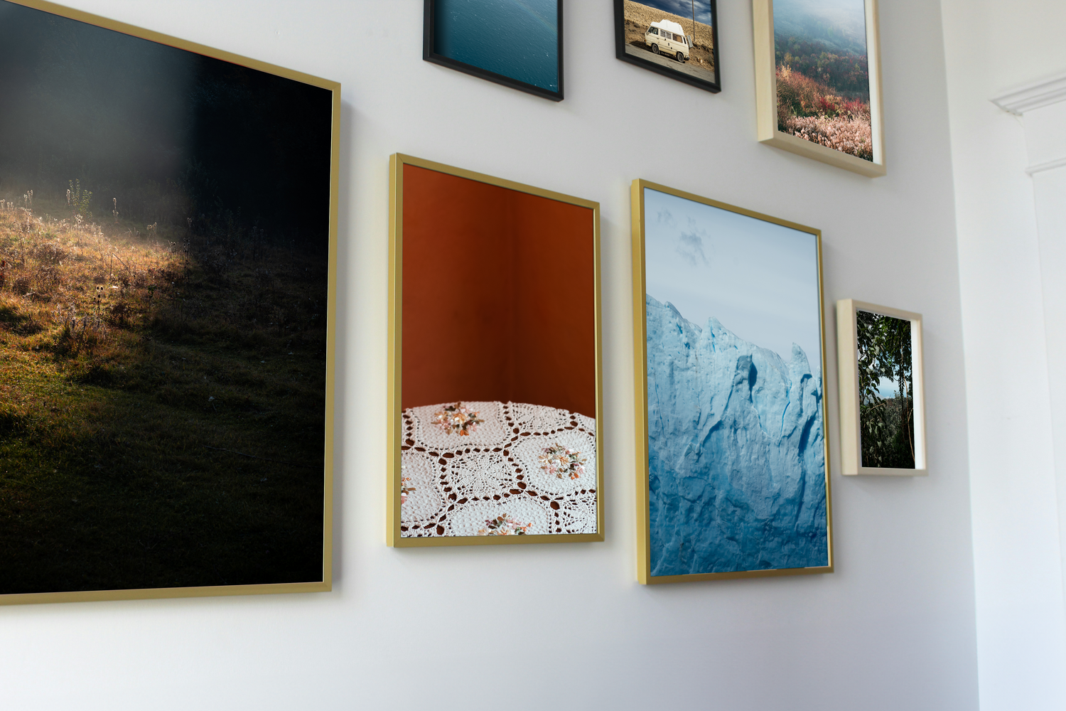 frames with dragon dreams photos on the white wall